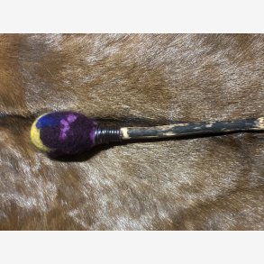 Trommestik p gren fra skoven 